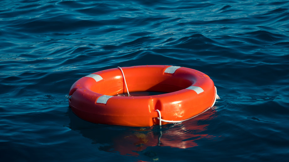 A picture containing water, orange, boat, bright Description automatically generated